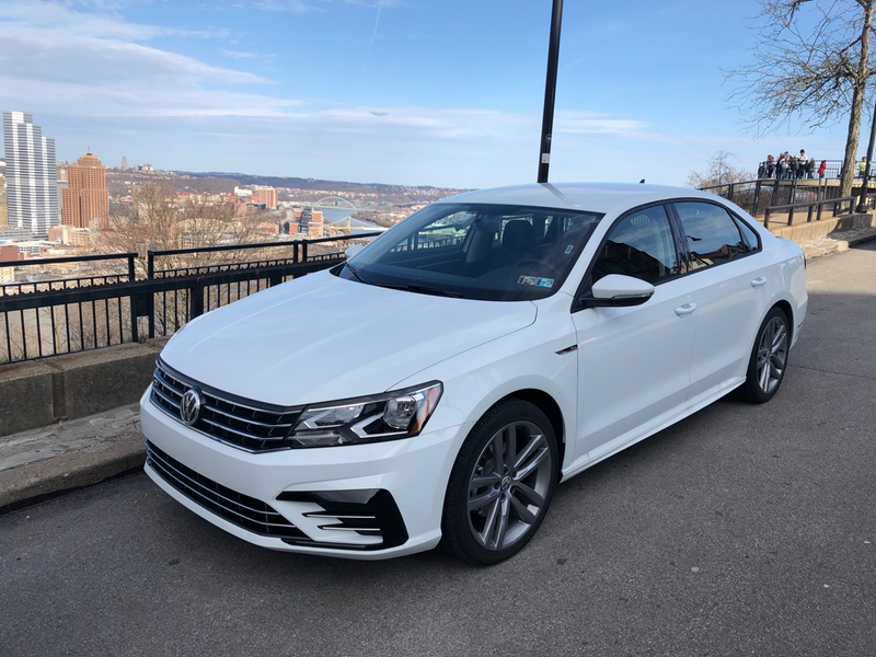 All these people taking pictures of the city on a rare sunny afternoon and I’m over here taking pictures of a rental car.